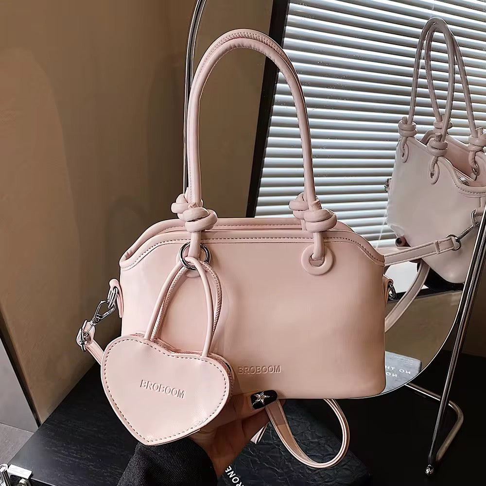 Elegant Handbags with heart charm coin purse in White, Red, Pink, and Black - Perfect for Any Occasion