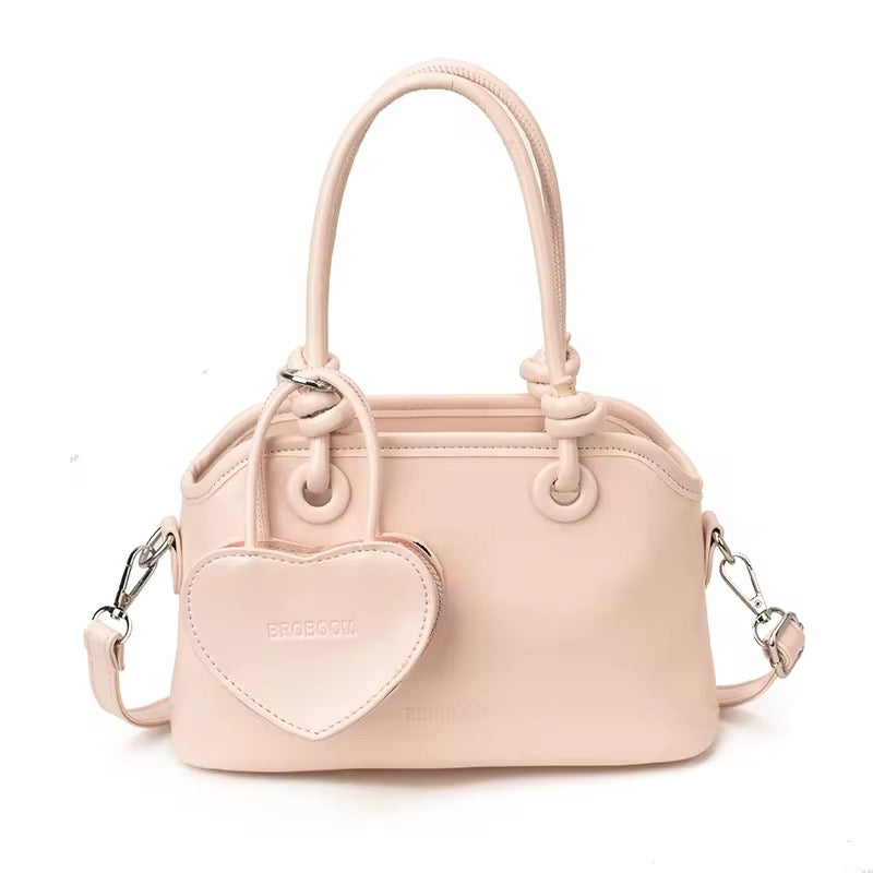 Elegant Handbags with heart charm coin purse in White, Red, Pink, and Black - Perfect for Any Occasion